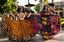 Dancers in traditional costumes for Day of the Dead in Mexico.